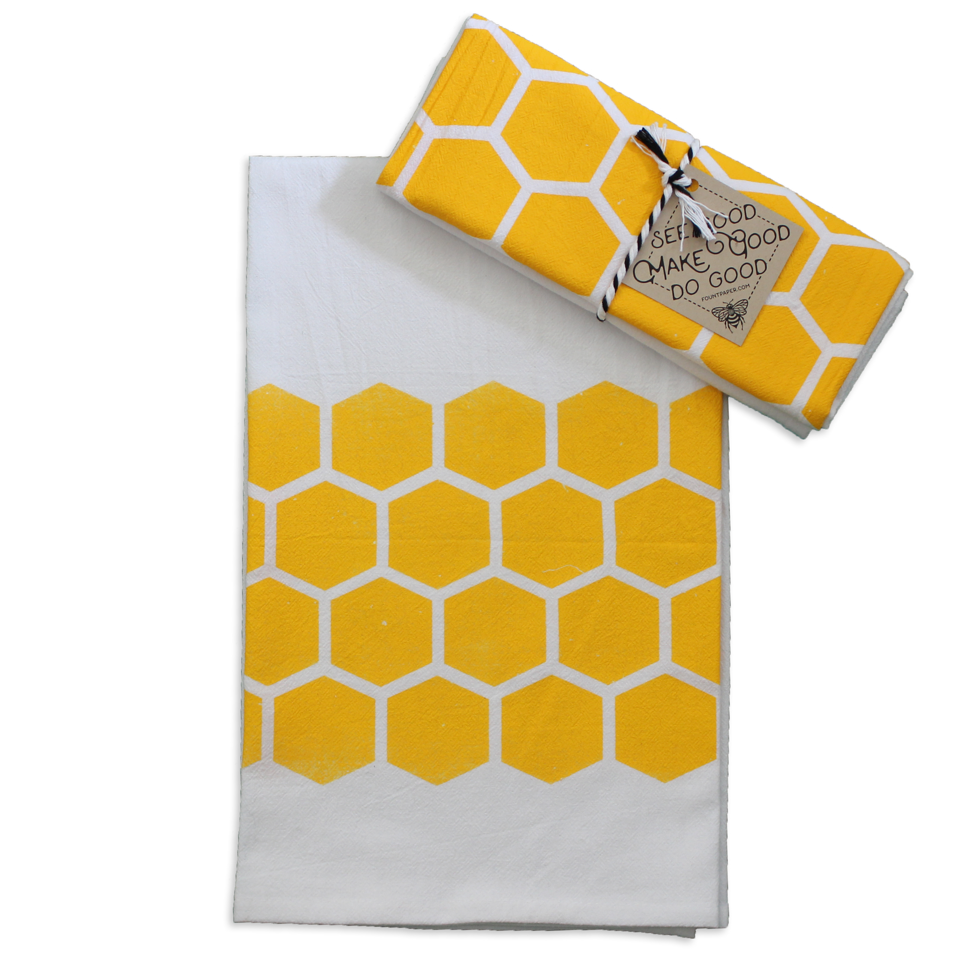 Yellow honeycomb tea towel gift wrapped in ribbon
